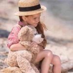 girl-and-bear Teddy Bear Hugs