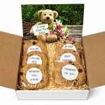 Bear Hug Cookie Gift Box 2 A gift box filled with gourmet cookies with inspirational messages and a large gift card that says A Hug Just for You