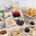 Breakfast Gift Basket with Pancakes, Coffee & Tea 2 Breakfast gift basket with pancake mix, maple syrup, coffee, scone mix, and blueberry preserves in a white crate