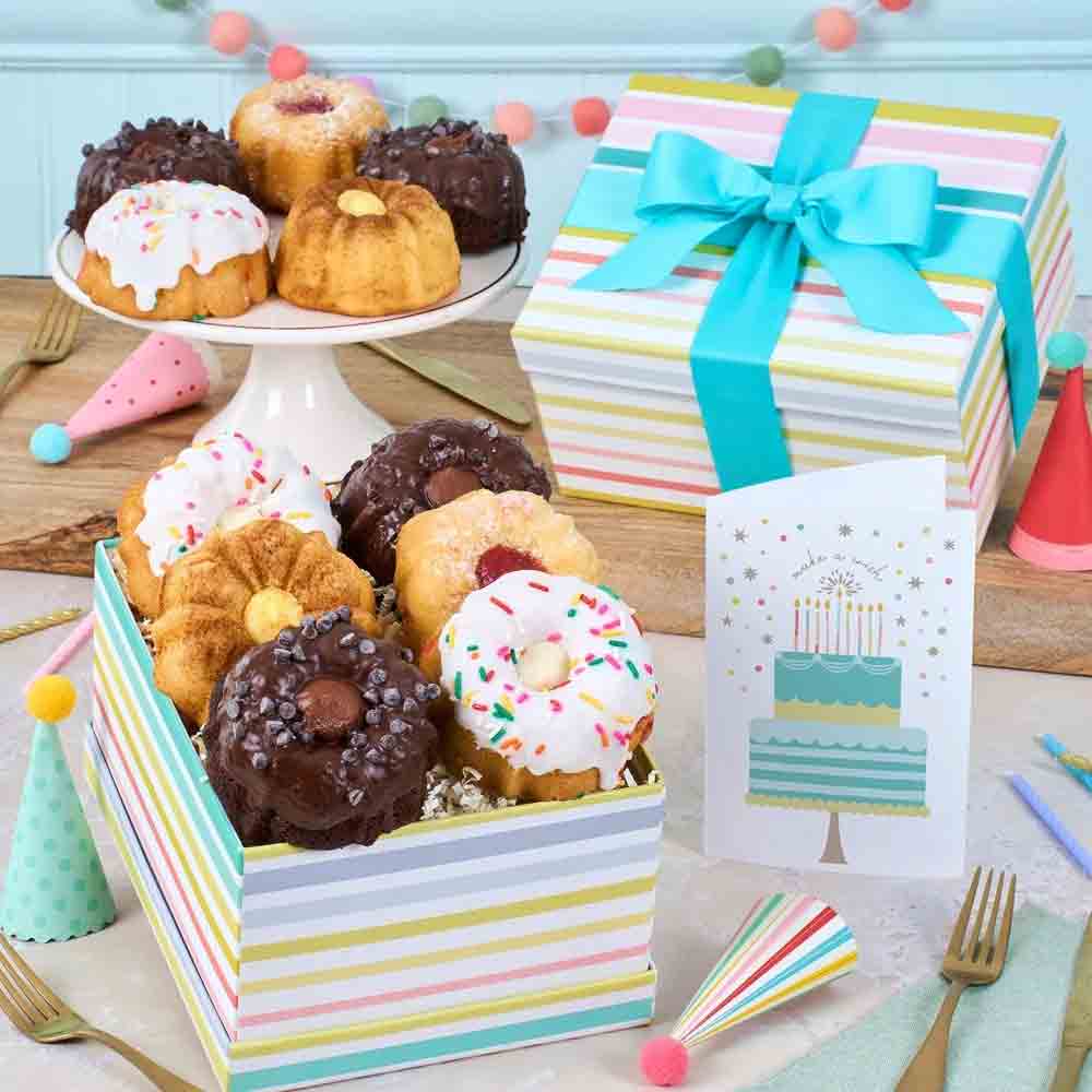 Birthday Bundt Cakes Gift Basket 1 Decorated birthday bundt cakes in gift box with ribbon and bow