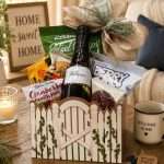 Welcome home gift basket with sparkling cider and snacks in picket fence gift box